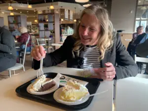 Stephanie enjoying Chocolate Mousse and Coconut Cream Pie! ?