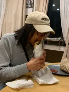 Sheli's first bite of a donair.
