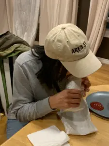 Sheli fully commits to the donair experience.