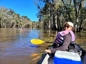 Sheli on the bayou (without her life jacket bucked up! ??)